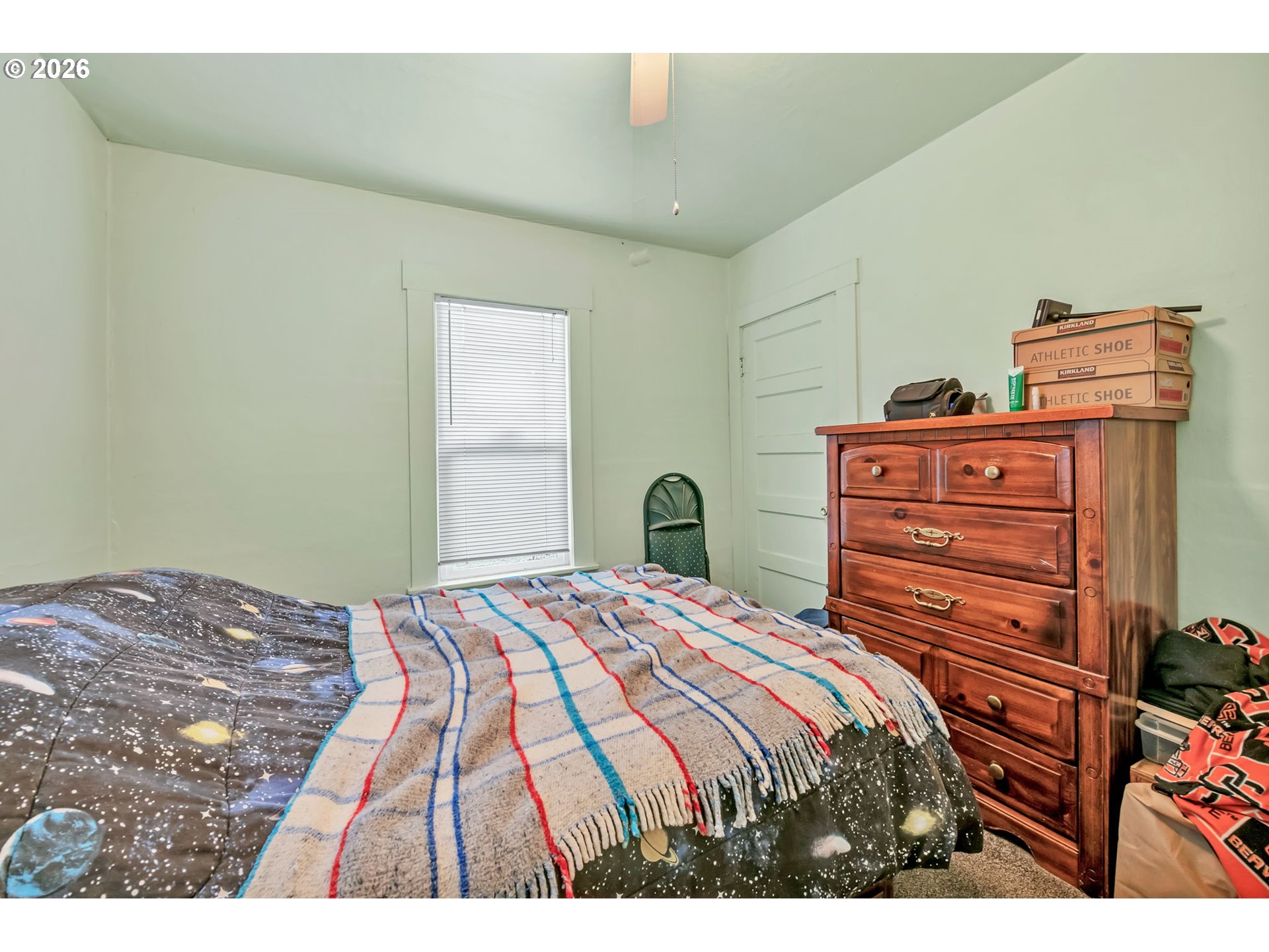 47054 Westfir-Oakridge Road Westfir, OR 97492 - Photo 15 of 28 a bedroom with a bed and a dresser