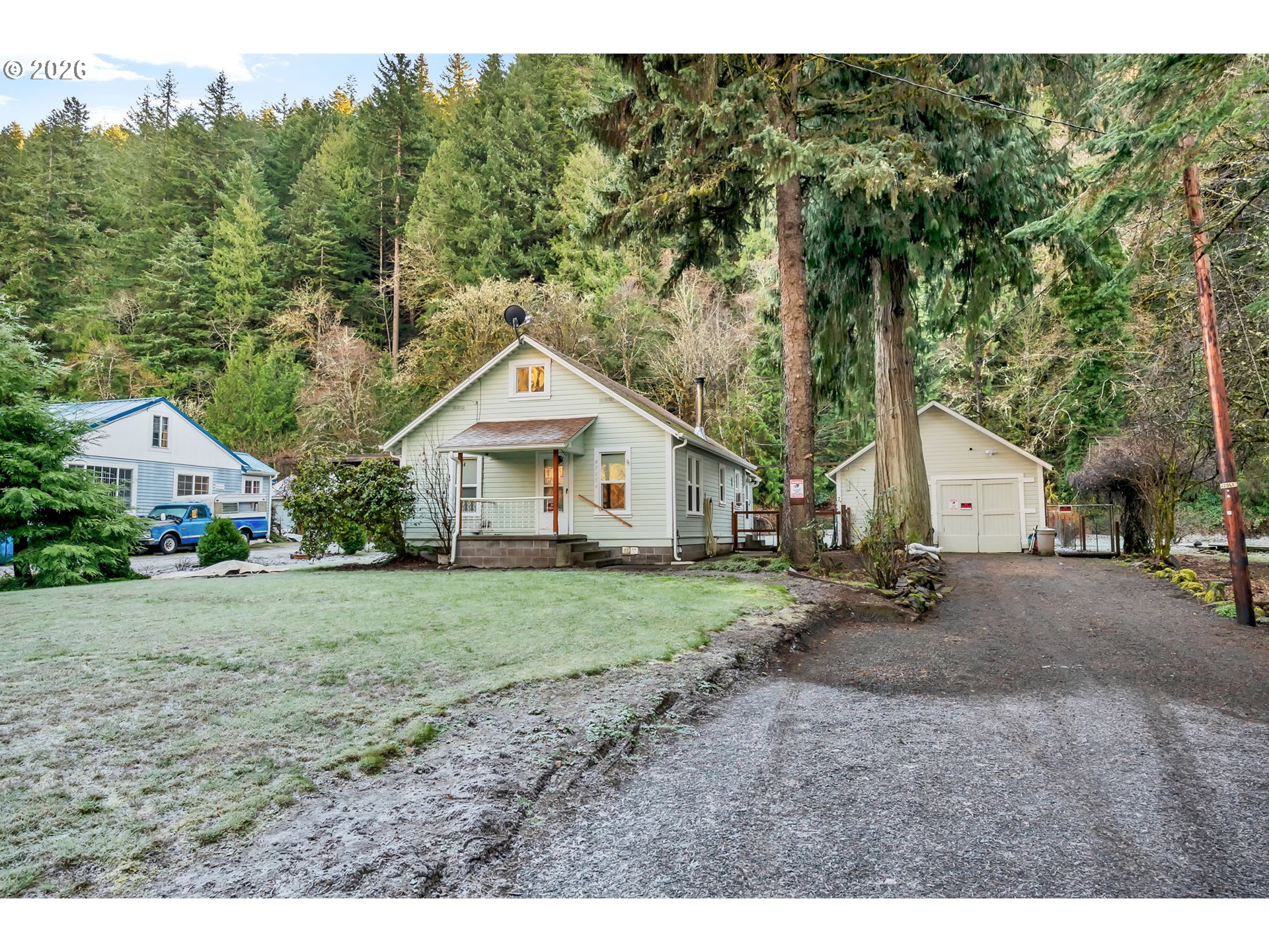 47054 Westfir-Oakridge Road Westfir, OR 97492 - Photo 2 of 28 a view of a house with a yard
