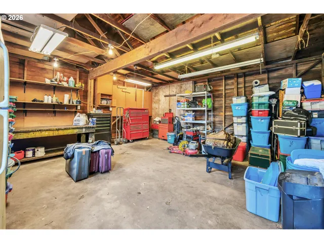 a room with lots of furniture and clutter