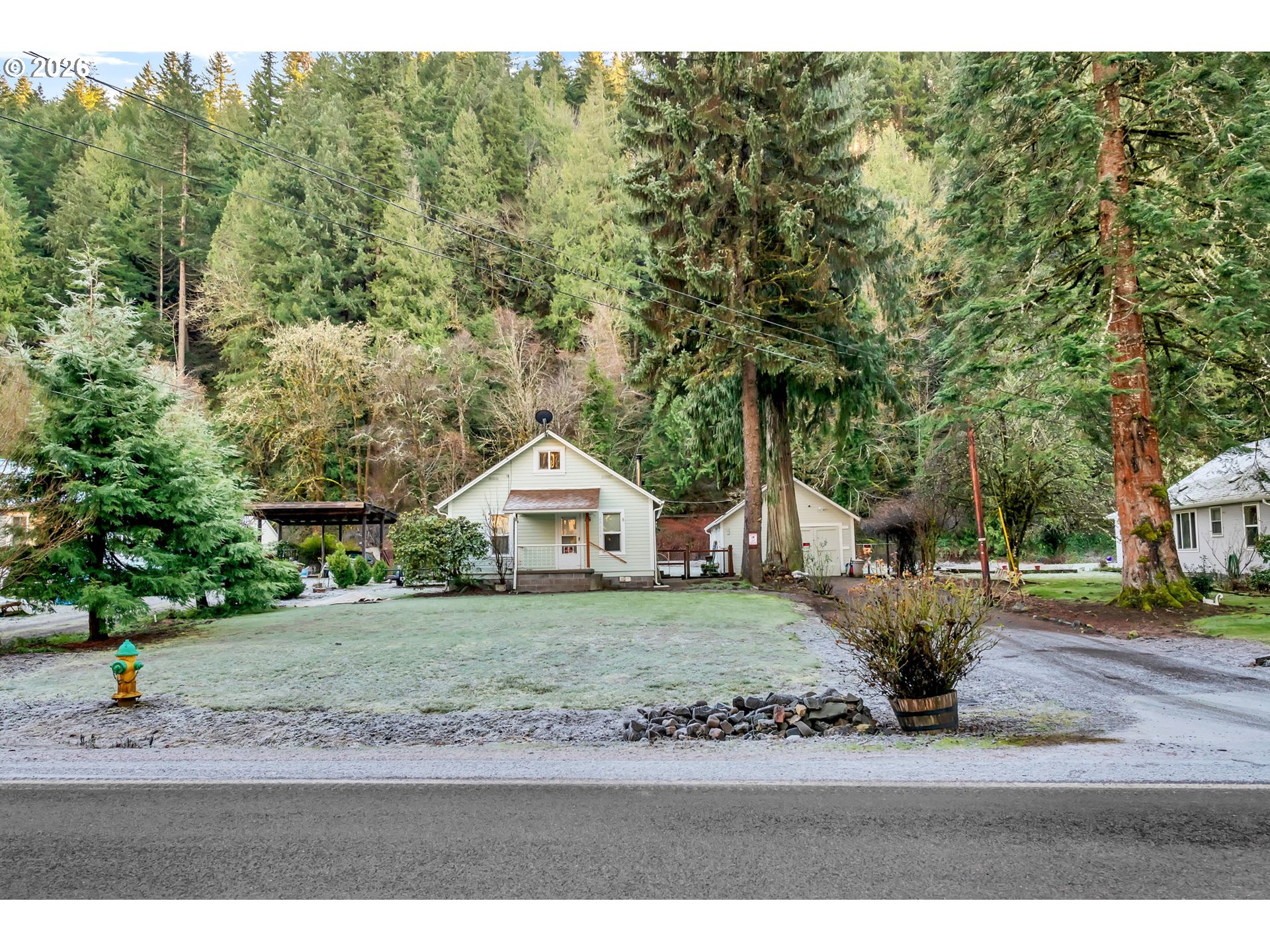 47054 Westfir-Oakridge Road Westfir, OR 97492 - Photo 3 of 28 a view of a town with barn house