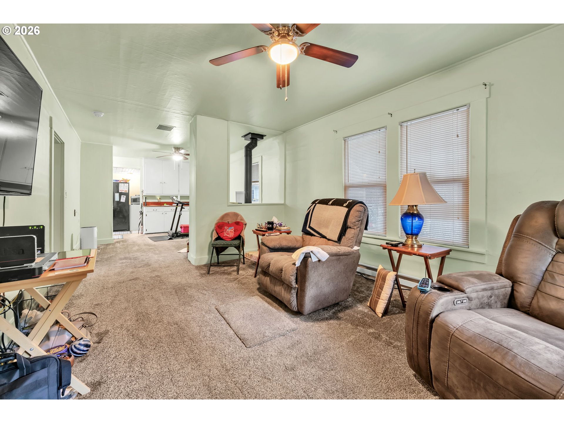 47054 Westfir-Oakridge Road Westfir, OR 97492 - Photo 6 of 28 a living room with furniture and a chandelier