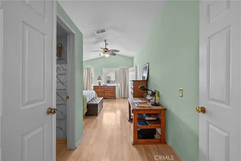 a room with furniture and wooden floor