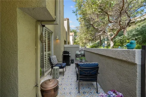 a house view with a outdoor seating space