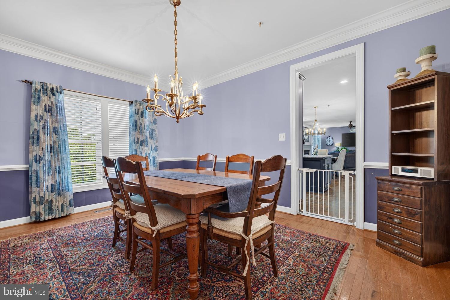 23106 Birch Mead Road Clarksburg, MD 20871 - Photo 10 of 60 a view of a dining room with furniture and chandelier