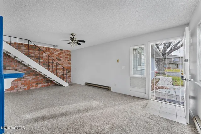 en view interior of a house with an entryway and stairs