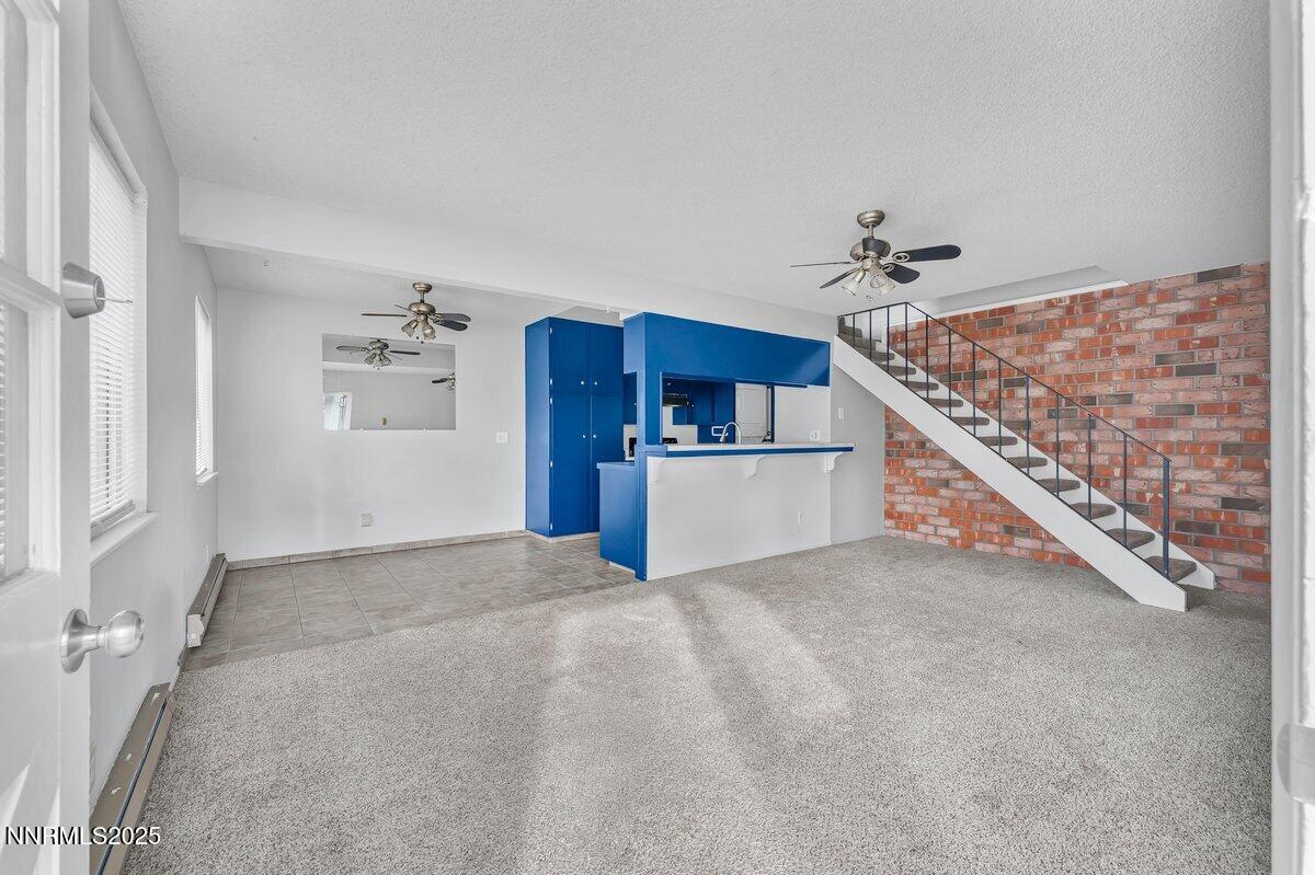 765 Jamaica Avenue, Unit 2 Reno, NV 89502 - Photo 3 of 23 a view of a livingroom with a staircase