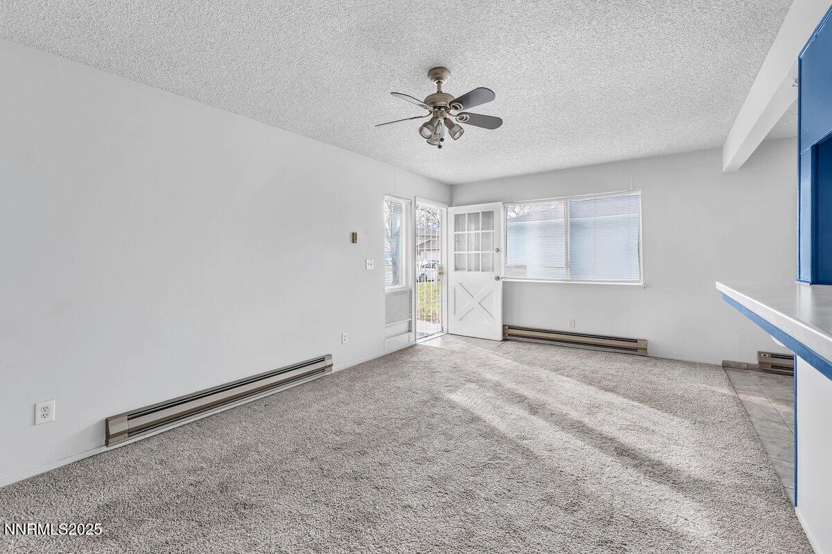 765 Jamaica Avenue, Unit 2 Reno, NV 89502 - Photo 5 of 23 a view of an empty room with a window