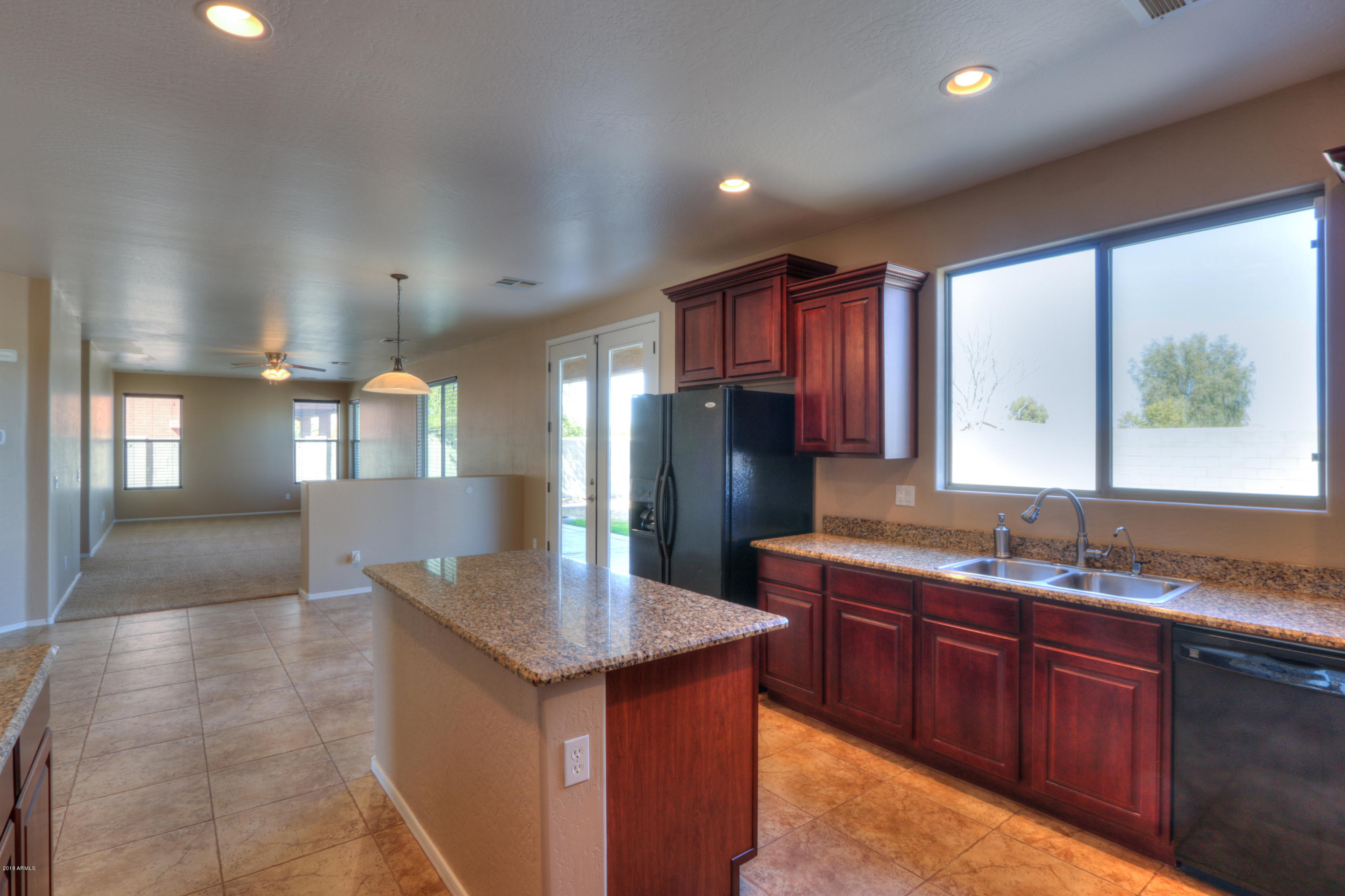 45662 West Mountain View Road Maricopa, AZ 85139 - Photo 14 of 64 Cherry wood cabinets