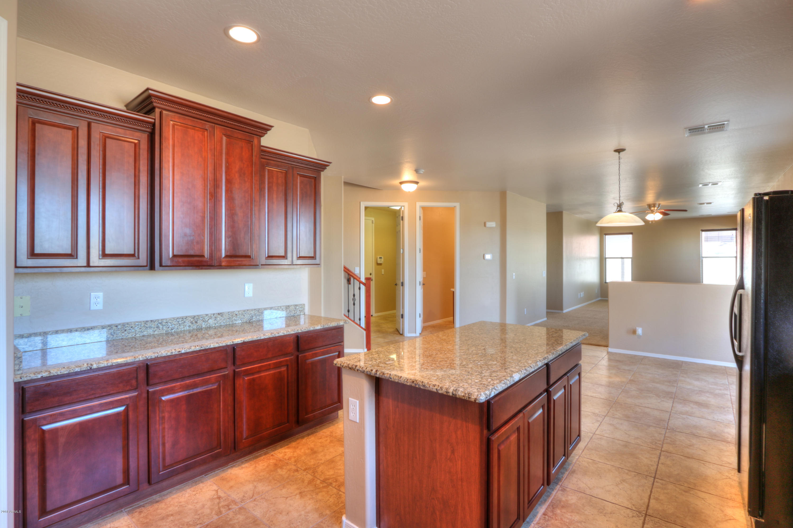 45662 West Mountain View Road Maricopa, AZ 85139 - Photo 15 of 64 Staggered Kitchen Cabinets
