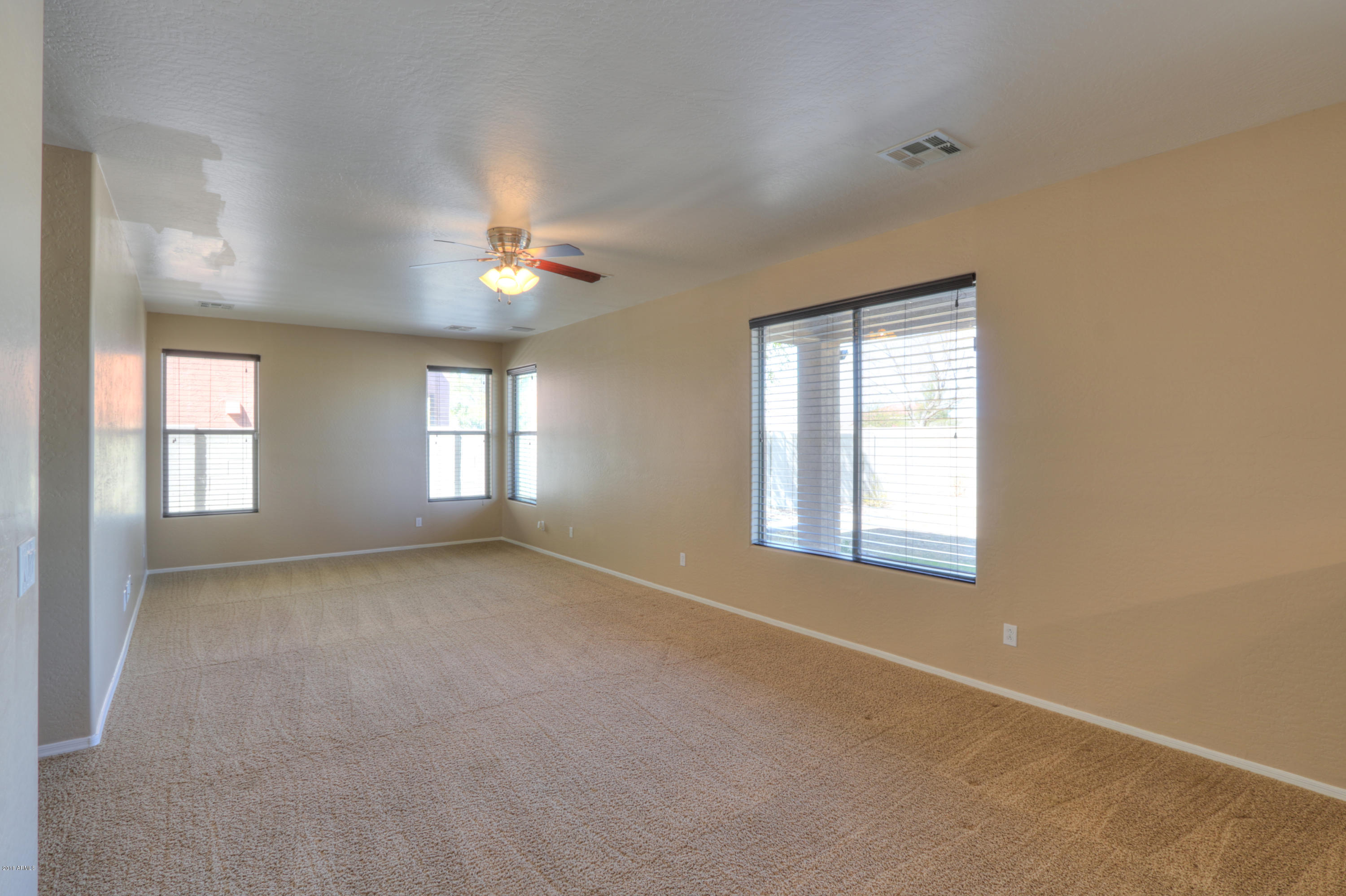 45662 West Mountain View Road Maricopa, AZ 85139 - Photo 17 of 64 Family Room