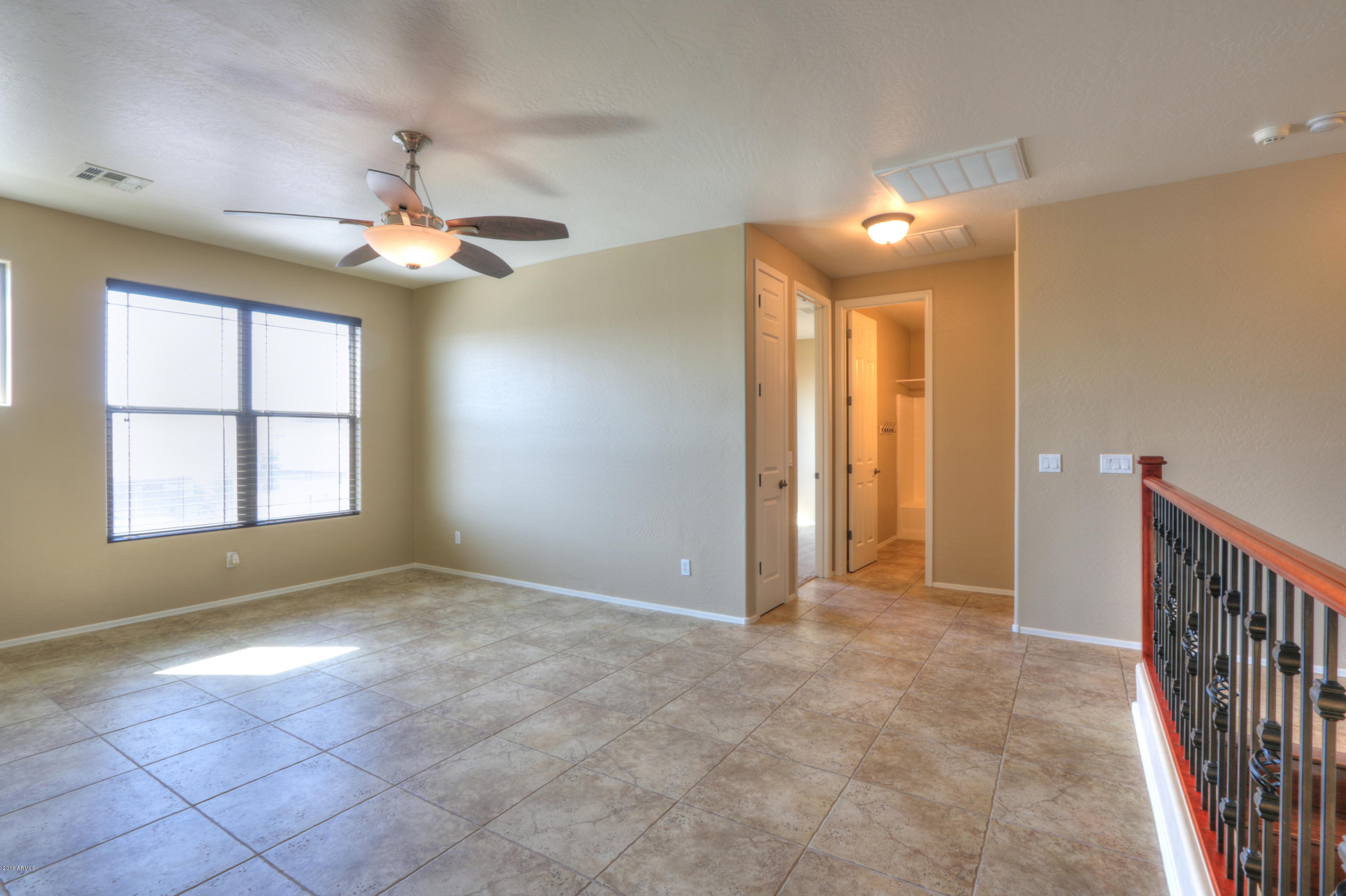 45662 West Mountain View Road Maricopa, AZ 85139 - Photo 32 of 64 Loft looking to bedroom #1