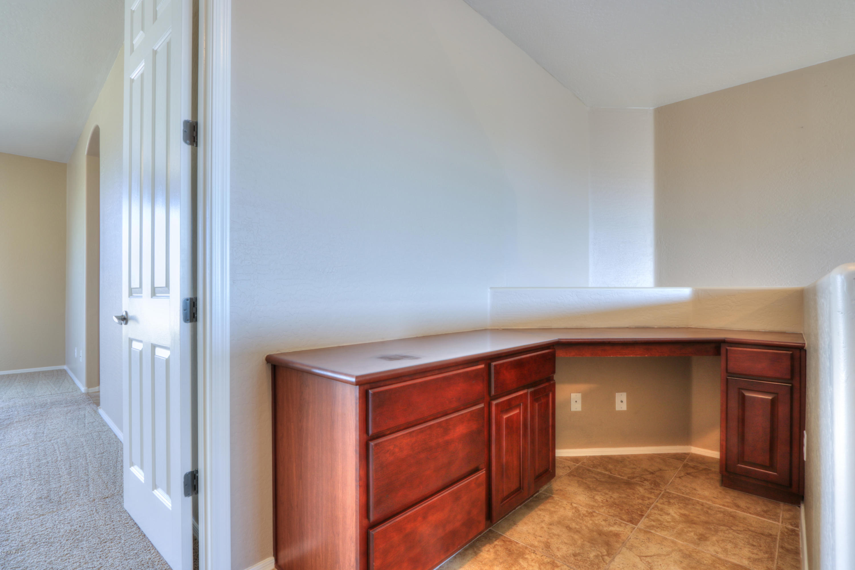 45662 West Mountain View Road Maricopa, AZ 85139 - Photo 33 of 64 Built in woode n desk