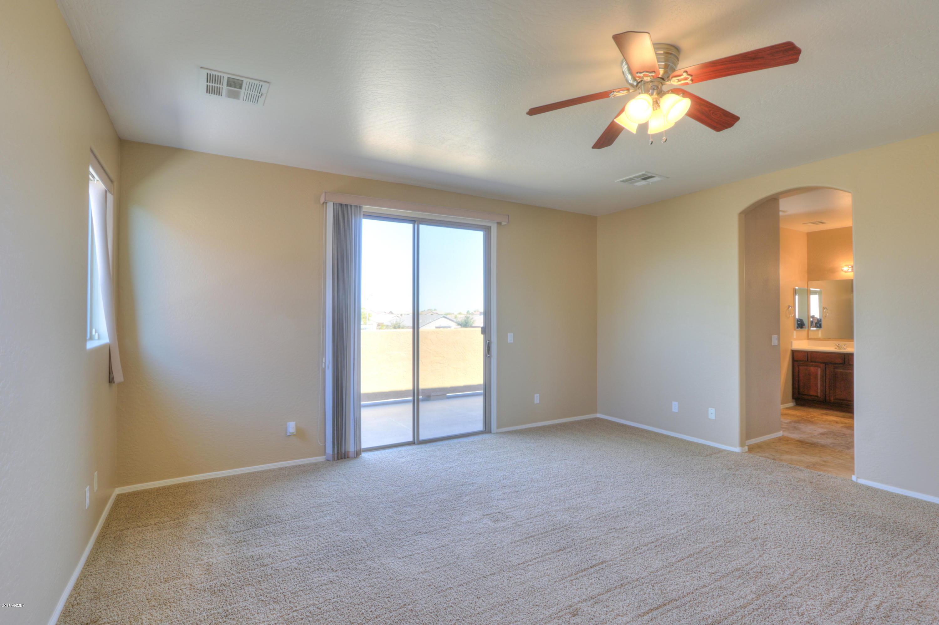 45662 West Mountain View Road Maricopa, AZ 85139 - Photo 47 of 64 Master Bedroom over loking full balcony