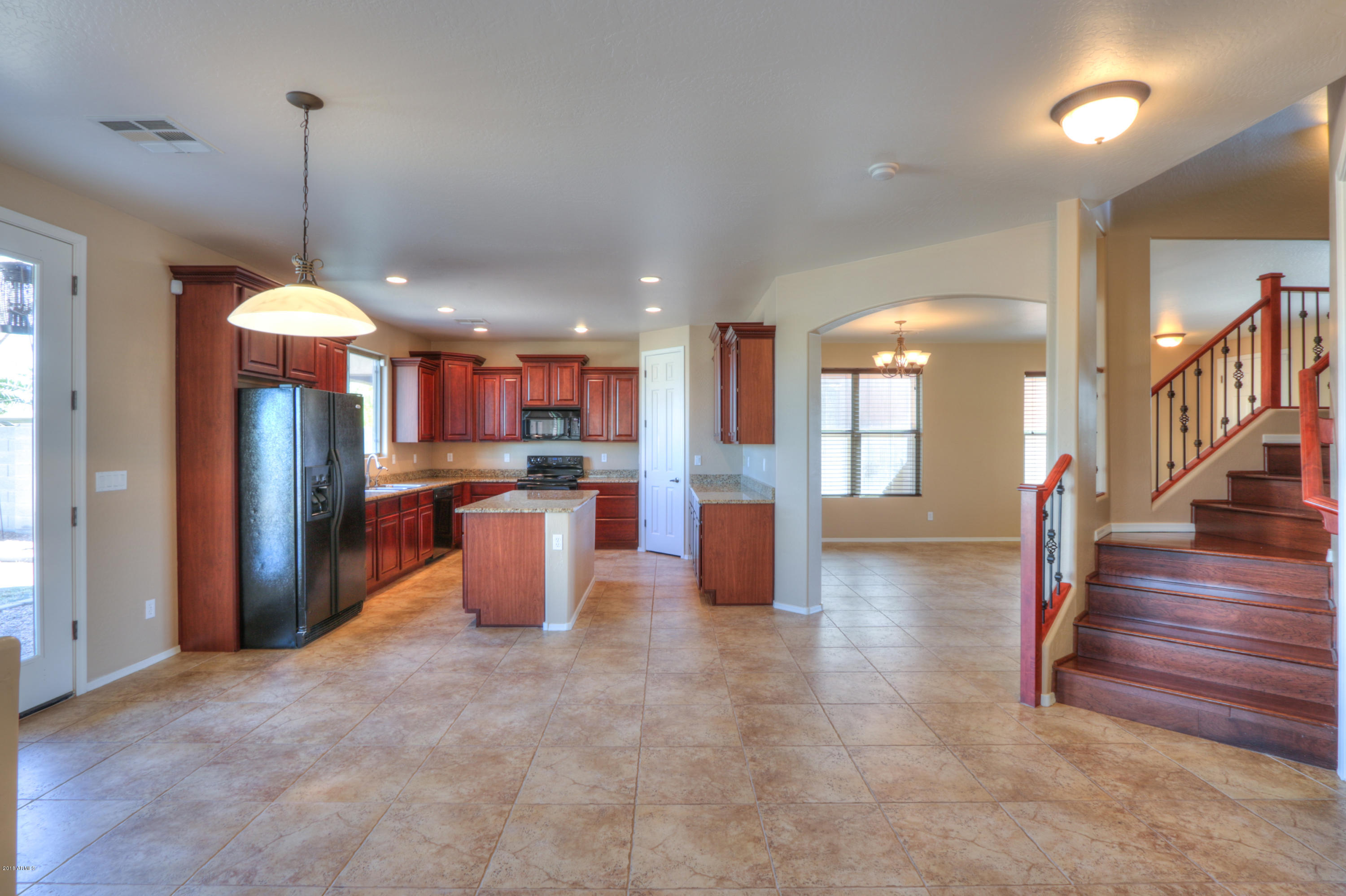 45662 West Mountain View Road Maricopa, AZ 85139 - Photo 10 of 64 Kitchen facing stairway