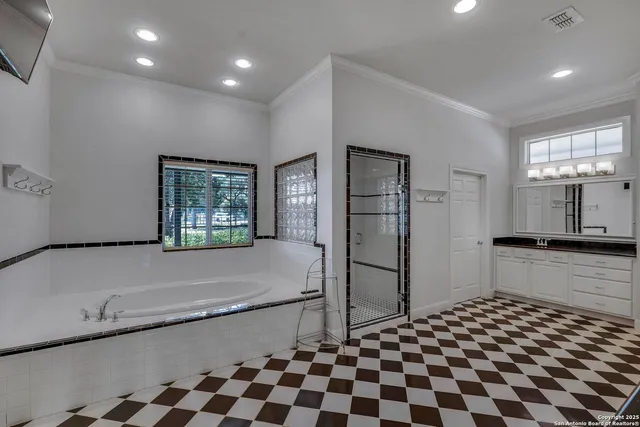 a kitchen with a refrigerator and a sink