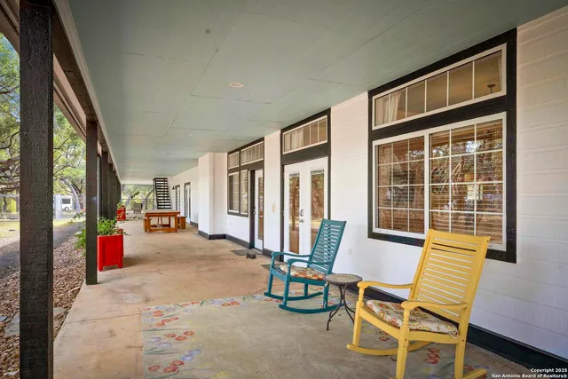 a view of a livingroom with couch and a cycle