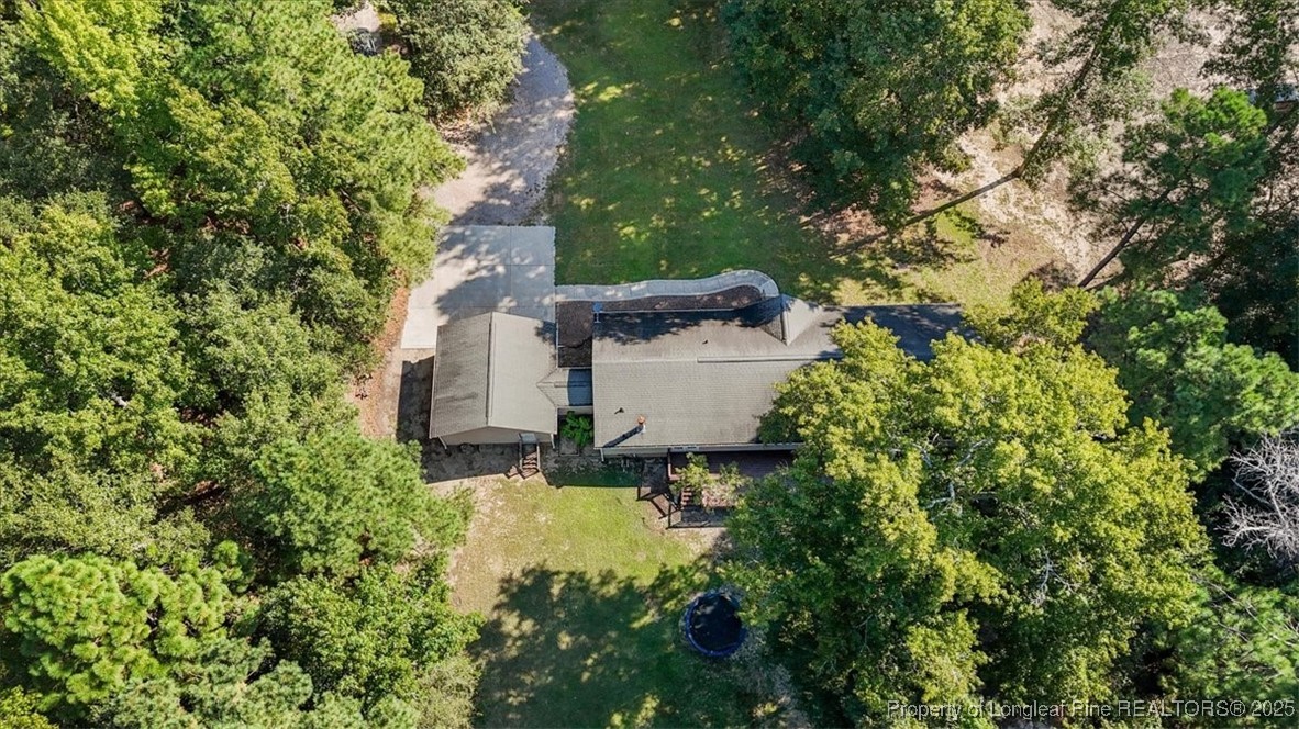 11891 Aberdeen Road Aberdeen, NC 28315 - Photo 32 of 35 an aerial view of a house with a yard