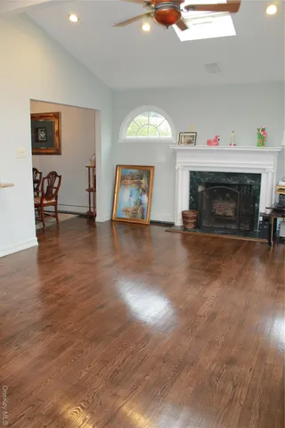 a living room with furniture and a window