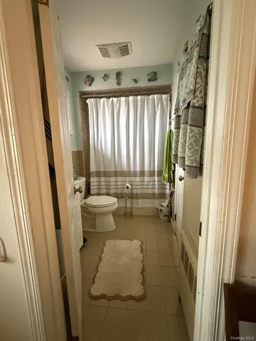 a bathroom with a sink a toilet and a bathtub