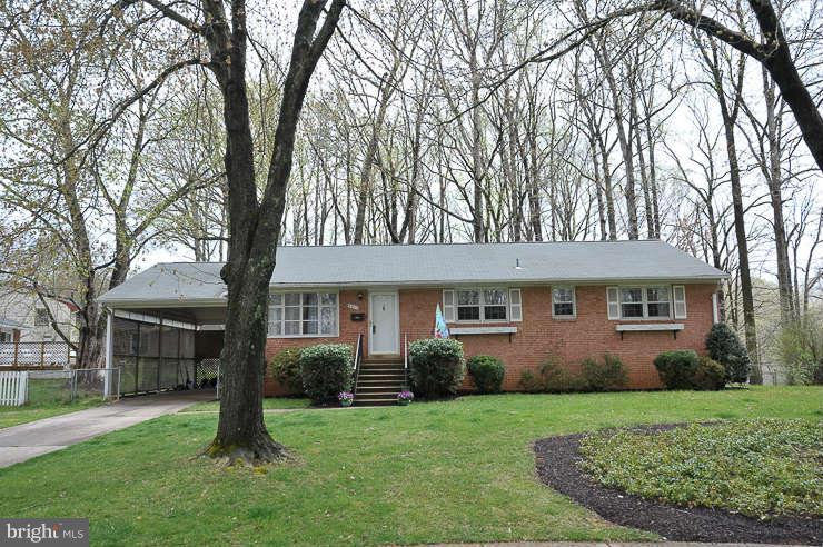 5613 Rathbone Place Springfield, VA 22151 - Photo 1 of 22 a view of a house with a backyard