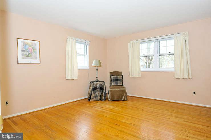 5613 Rathbone Place Springfield, VA 22151 - Photo 12 of 22 a bedroom with a bed and window
