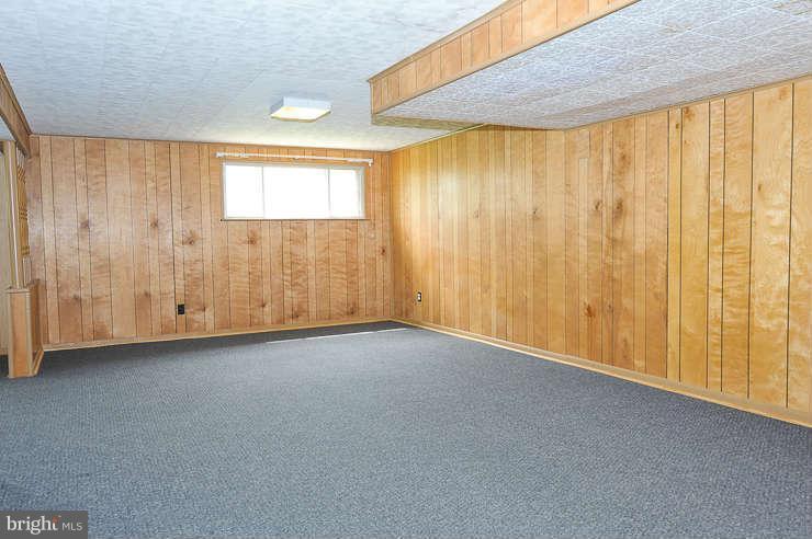 5613 Rathbone Place Springfield, VA 22151 - Photo 16 of 22 a view of an empty room with a window
