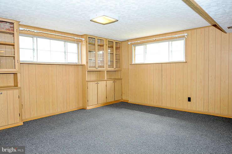 5613 Rathbone Place Springfield, VA 22151 - Photo 18 of 22 a view of an empty room with a window