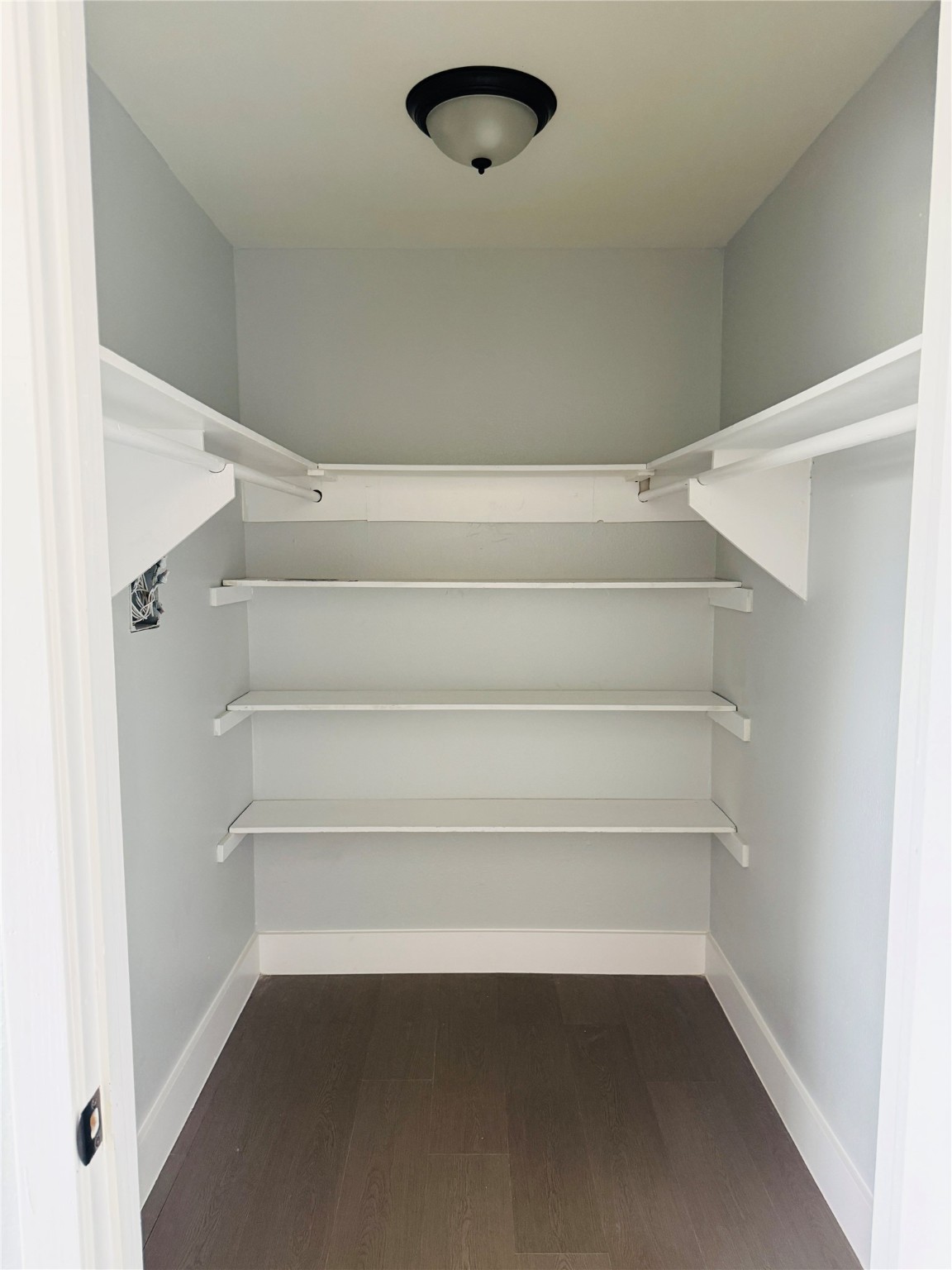 1125 Ann, Unit 4 Pasadena, TX 77506 - Photo 4 of 6 a view of walk in closet with empty racks
