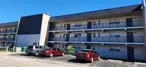 a front view of a building with glass windows