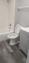 8020 North Colony Circle, Unit 110 Tamarac, FL 33321 - Photo 5 of 11 a bathroom with a toilet and a bathtub