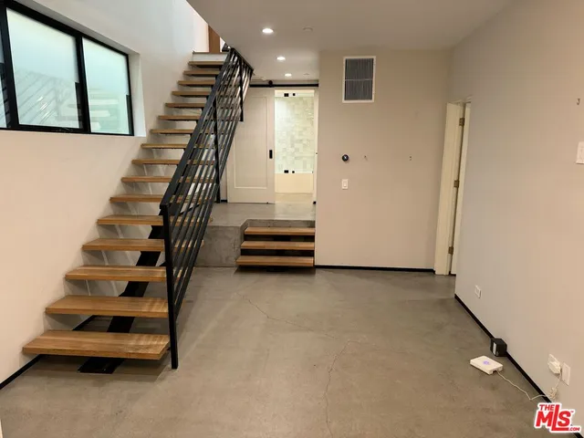 a bathroom with a bathtub and a sink