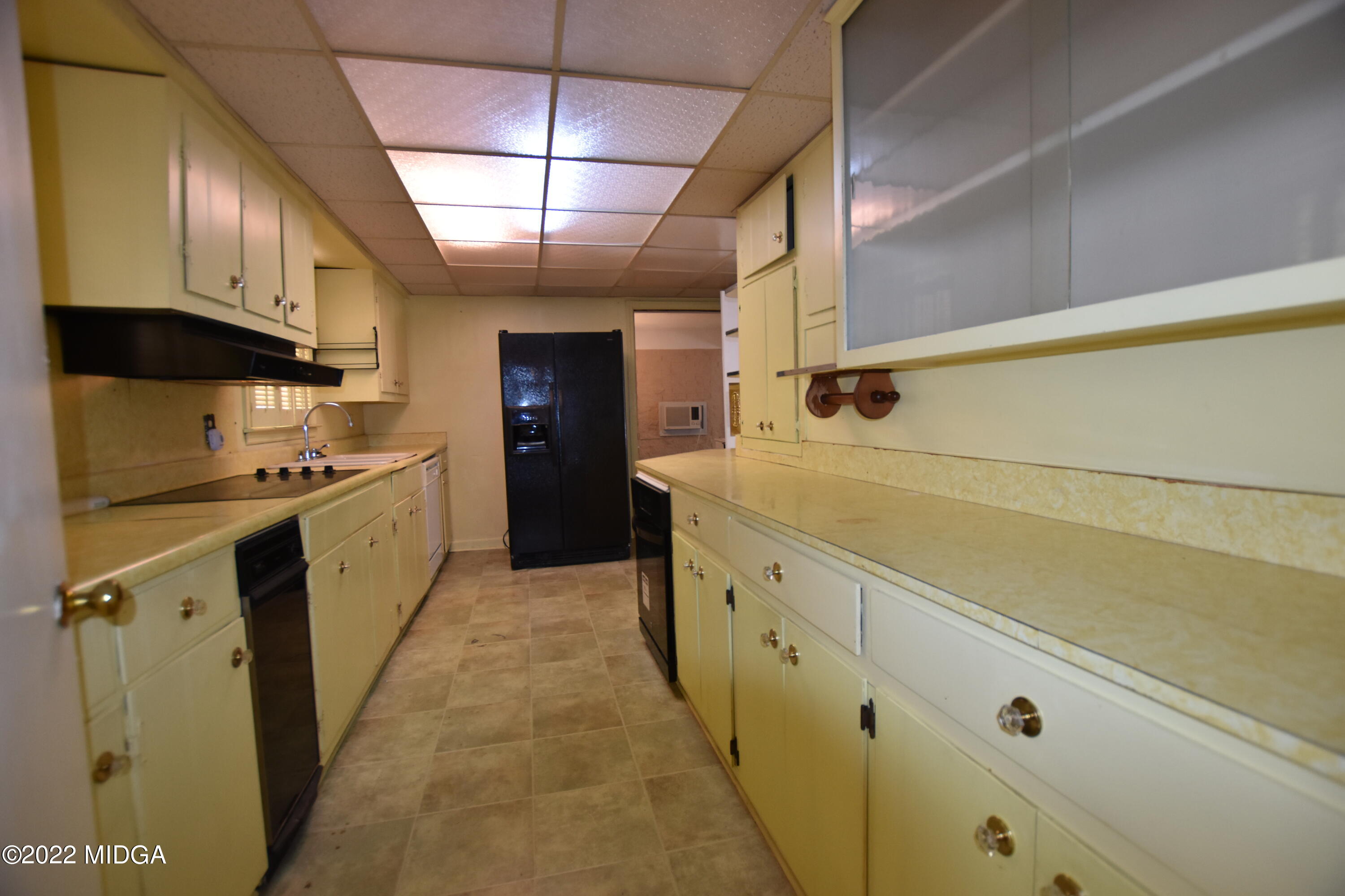 2159 General Winship Drive Macon, GA 31204 - Photo 11 of 31 a kitchen with cabinets a sink and appliances