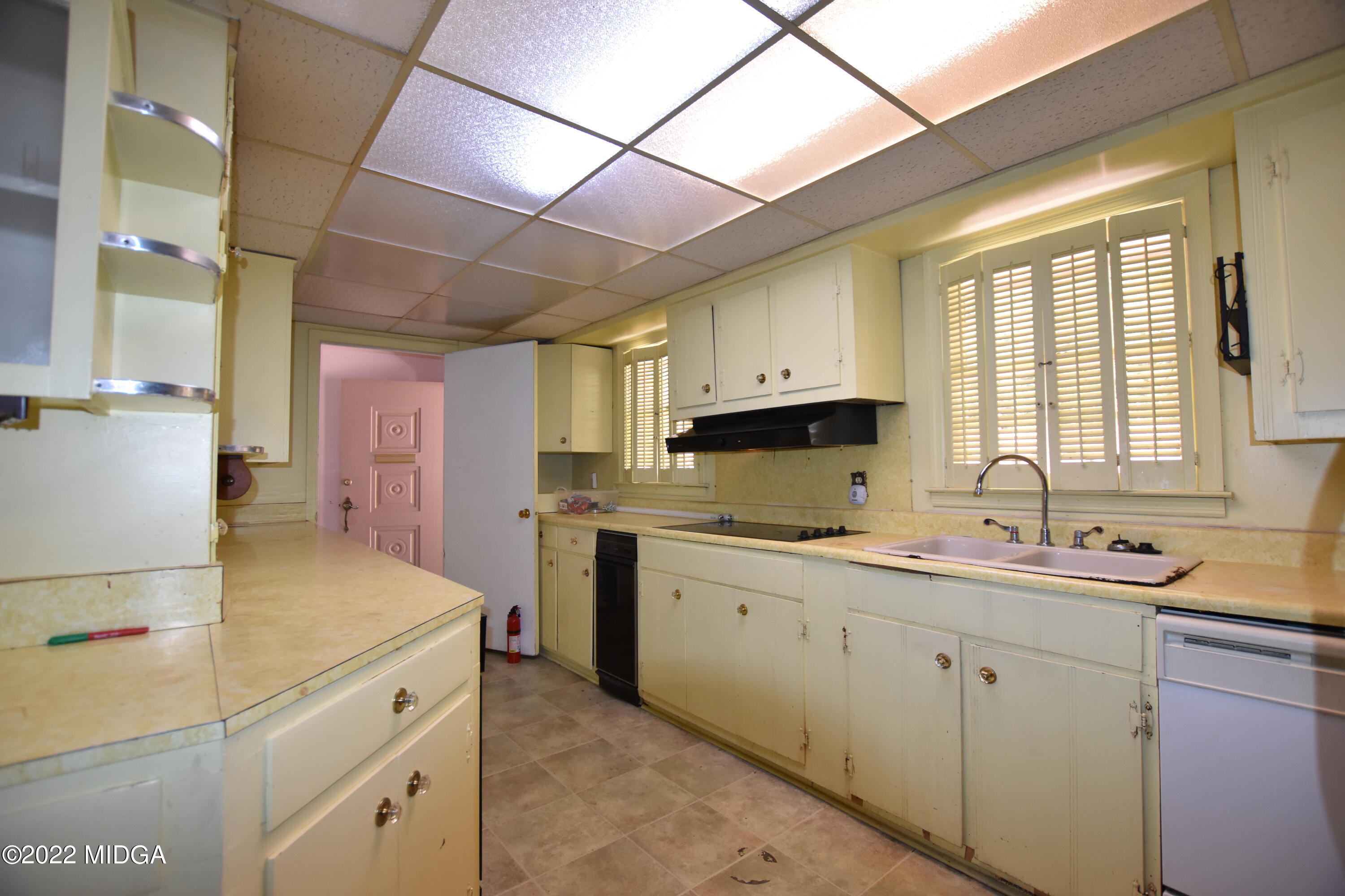 2159 General Winship Drive Macon, GA 31204 - Photo 13 of 31 a kitchen with a sink stove and cabinets