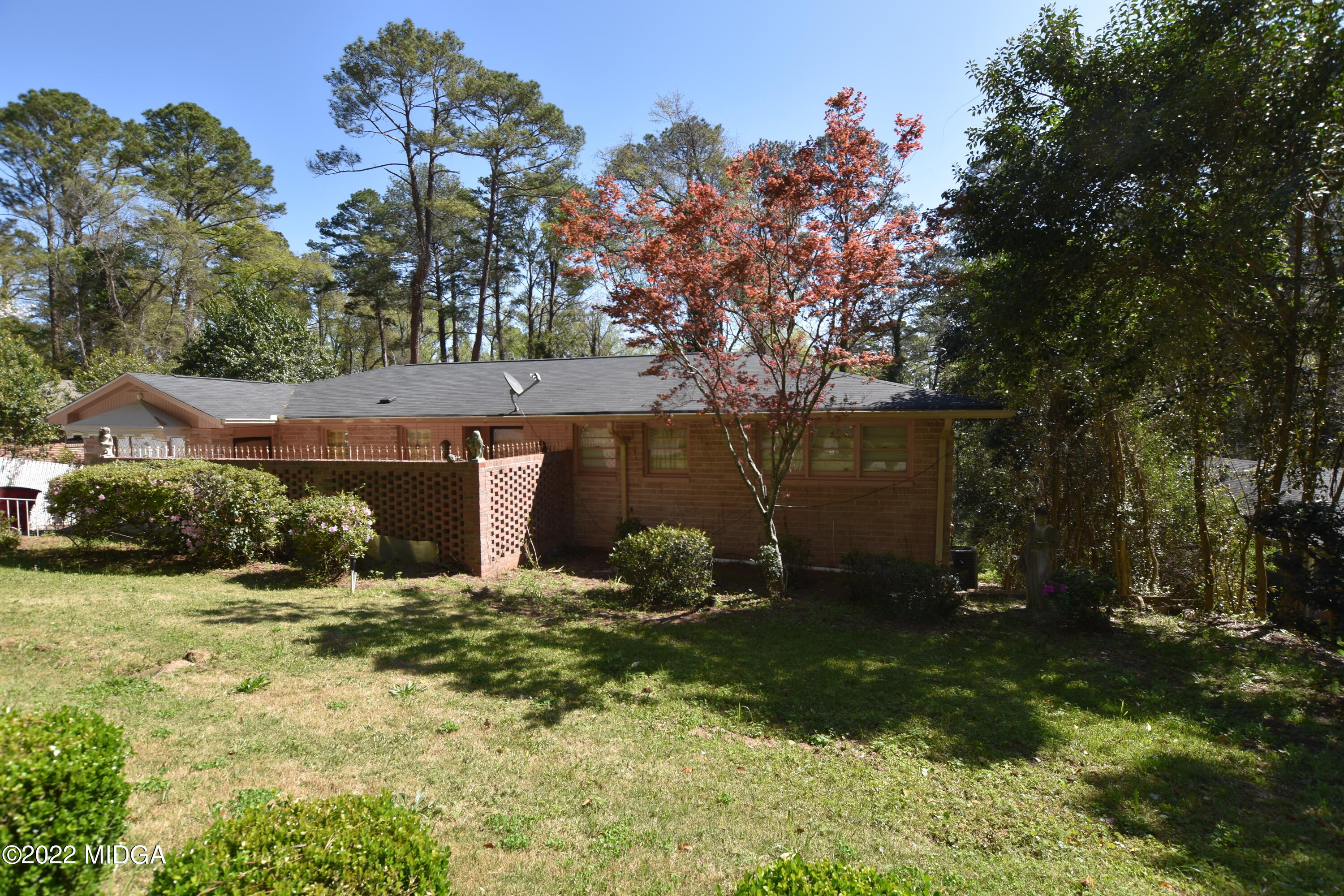 2159 General Winship Drive Macon, GA 31204 - Photo 2 of 31 a backyard of a house with lots of green space