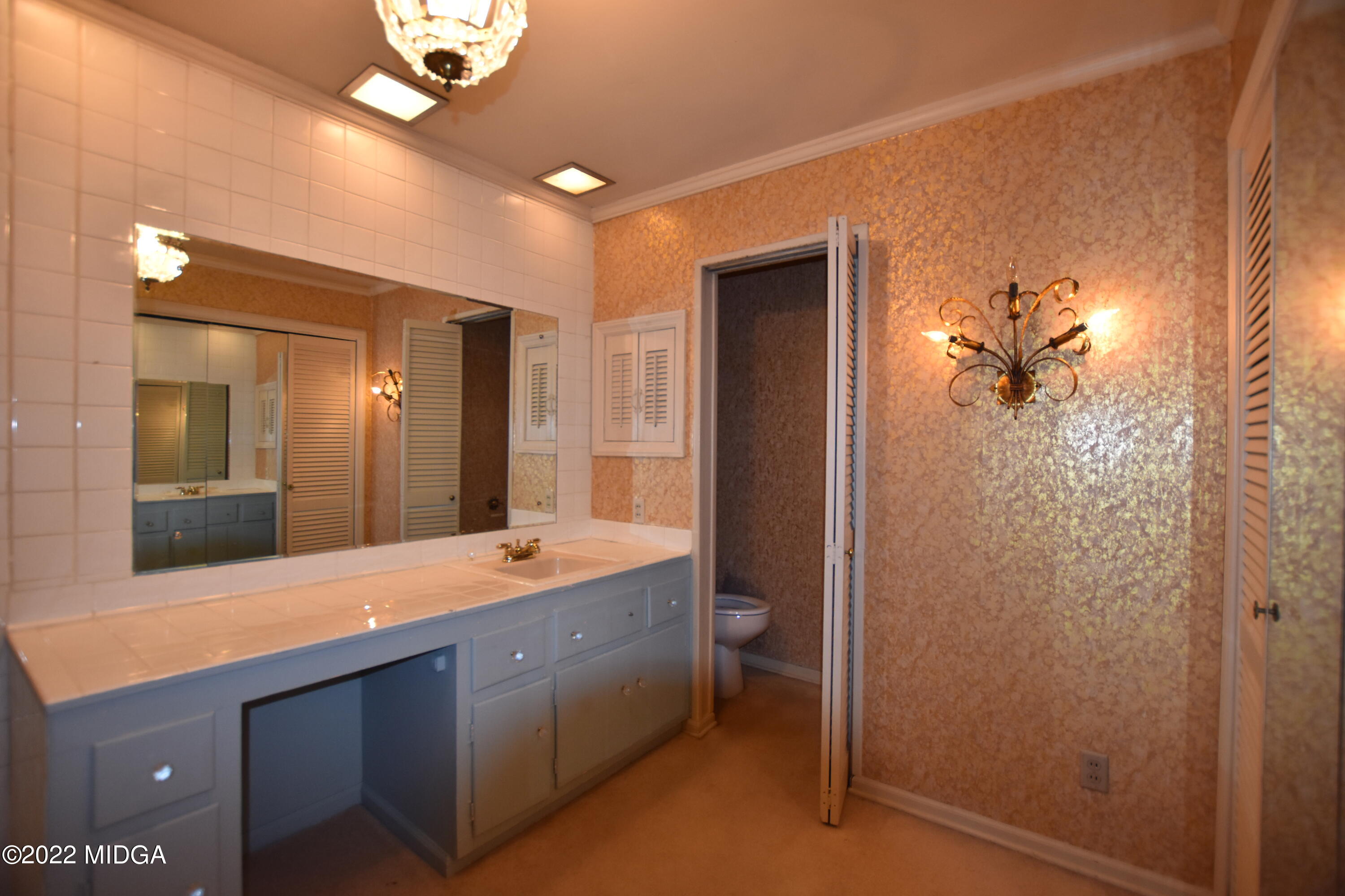 2159 General Winship Drive Macon, GA 31204 - Photo 24 of 31 a bathroom with a double vanity sink and a mirror