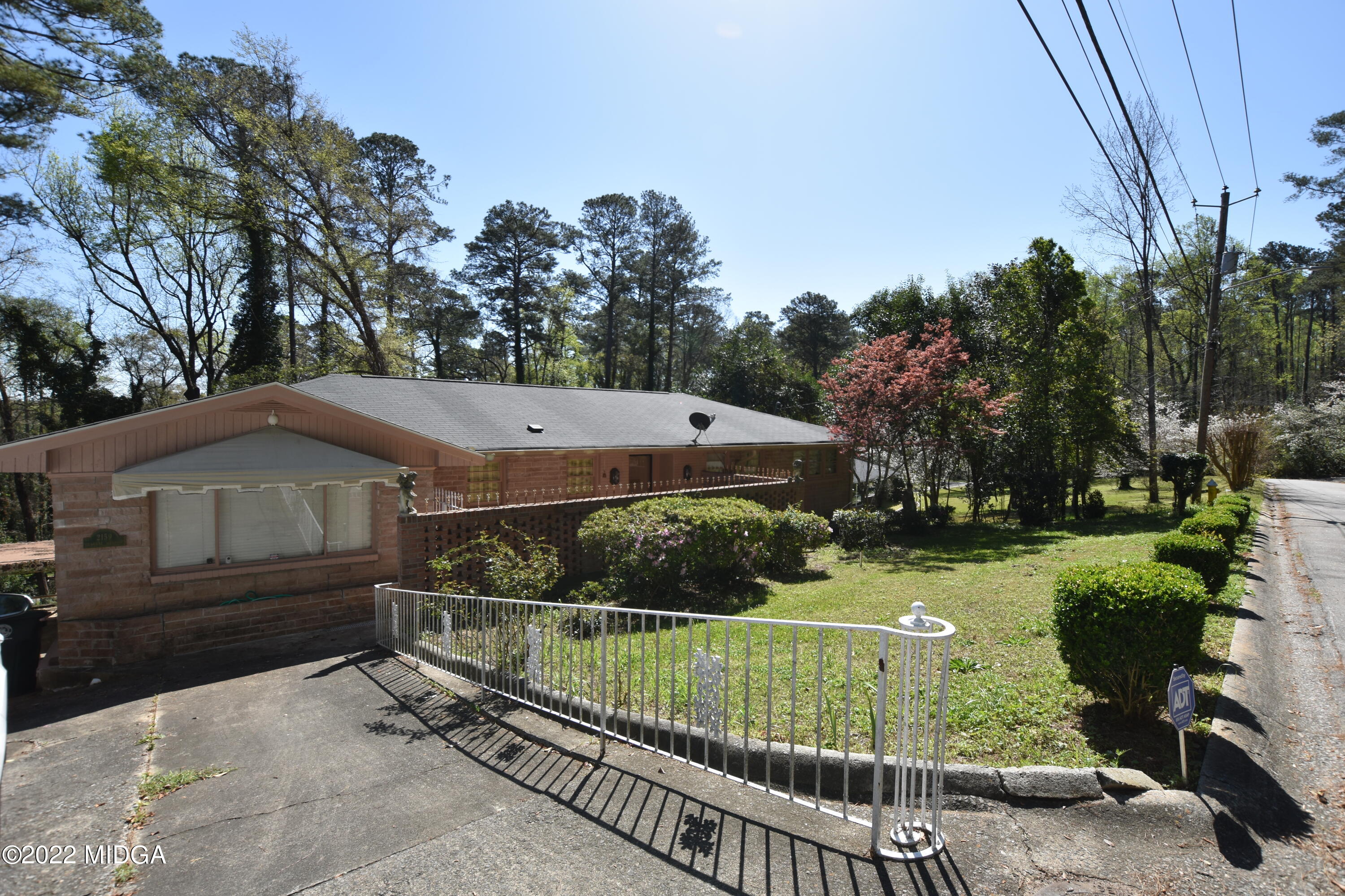 2159 General Winship Drive Macon, GA 31204 - Photo 3 of 31 a view of a garden with a slide
