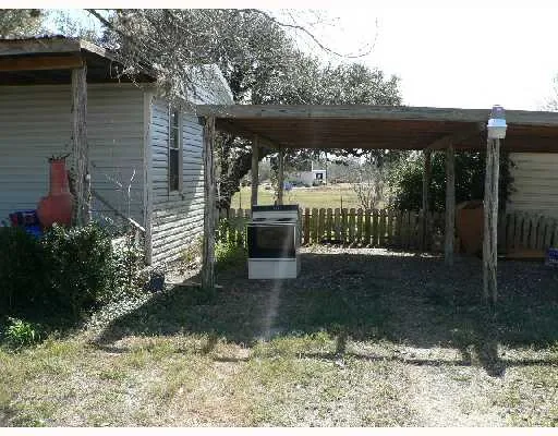 a view of a back yard of the house