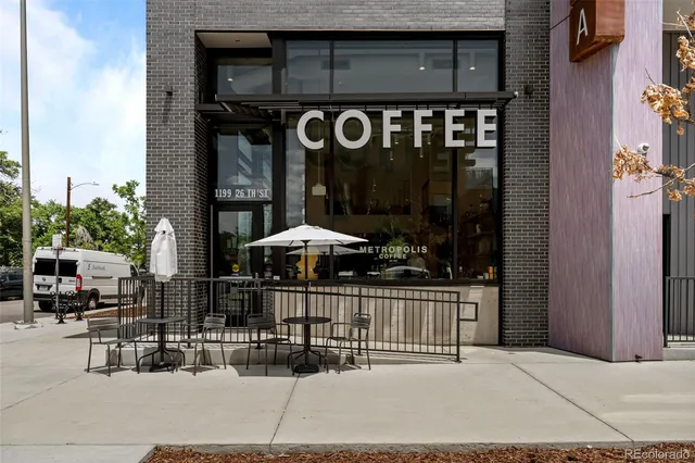a front view of a house with parking space