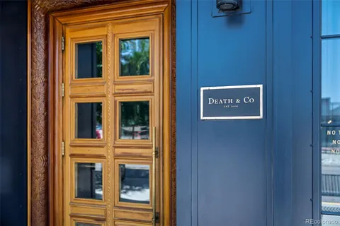 a view of a door and a window