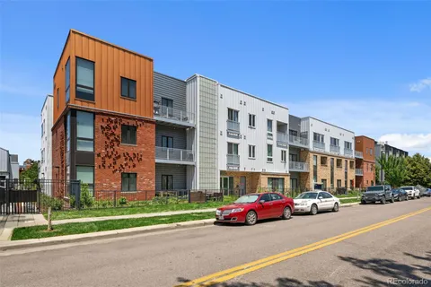 a car parked in front of a building