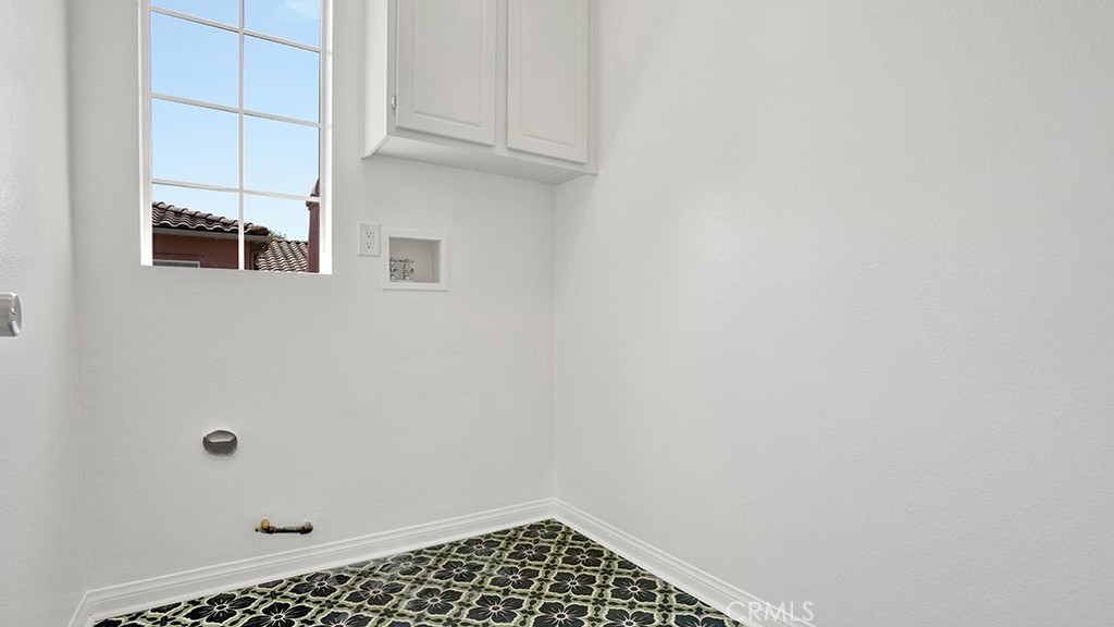 48 Walbert Lane Ladera Ranch, CA 92694 - Photo 30 of 34 Upstairs Laundry room