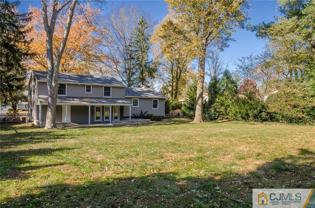 16 Ryan Road Cranbury, NJ 08512 - Photo 23 of 24 a house with trees in front of it