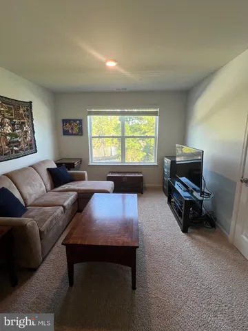 a room with a bed and a window