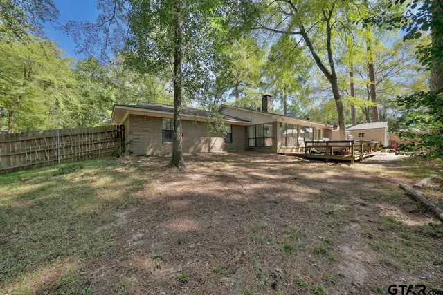 a house view with a outdoor space