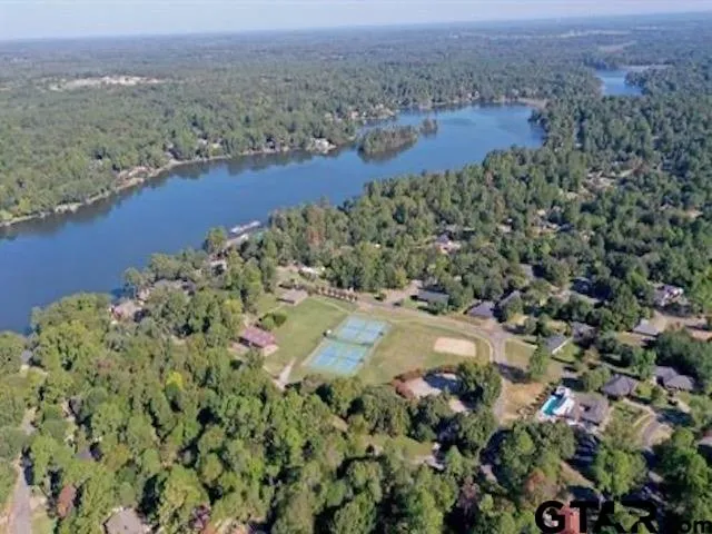 an aerial view of residential house with outdoor space