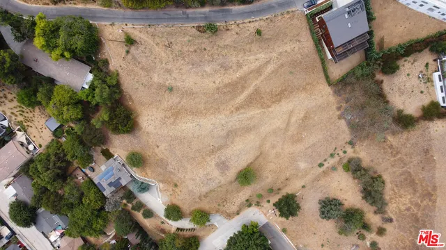 a buildings covered with snow in the background