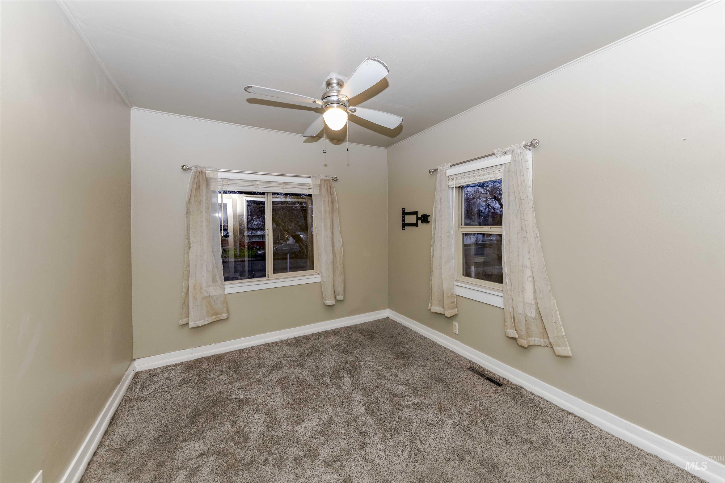 1906 15th Avenue Lewiston, ID 83501 - Photo 4 of 18 Bedroom with carpet and a ceiling fan