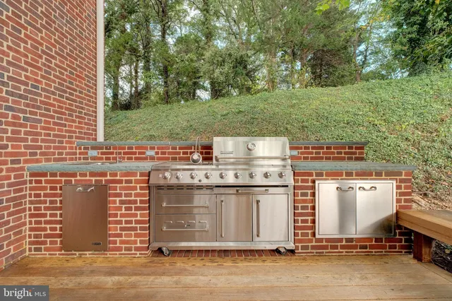 a living room with furniture fireplace and a flat screen tv