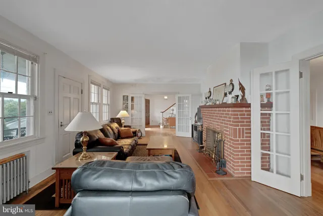 a kitchen with granite countertop a sink stove and cabinets