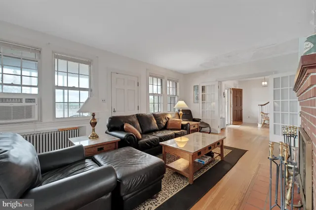a kitchen with stainless steel appliances kitchen island granite countertop a sink and cabinets